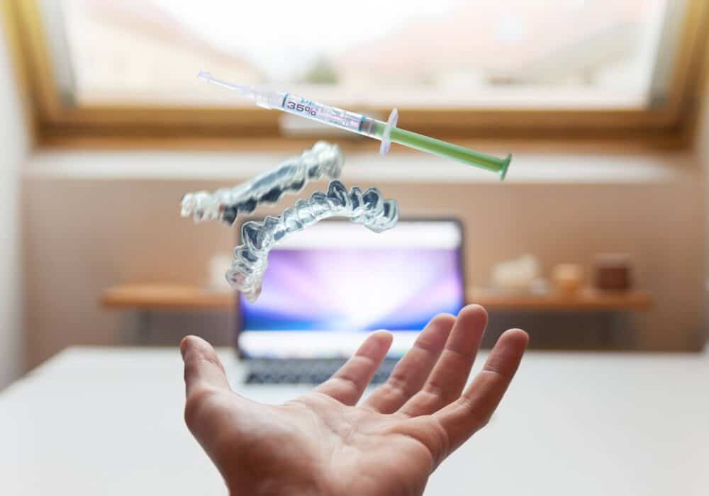 open palm with syringe floating